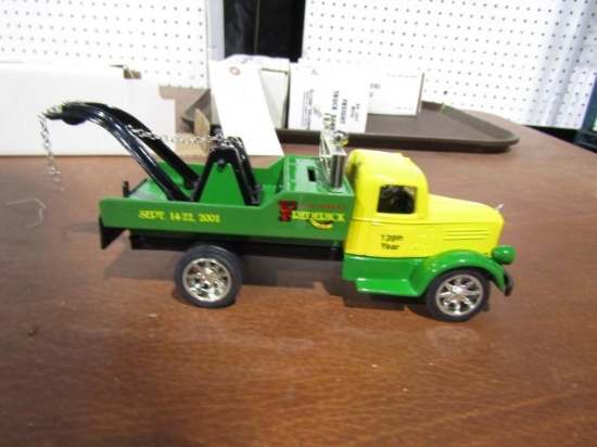 4 TRUCKS NEW IN BOX 2 MACK LJ TOW TRUCKS AND 2 FREIGHT TRUCK BANKS