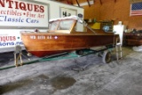 #102 1956 RUNABOUT BOAT AND TRAILER 13 1/2' PLYWOOD BOAT WITH EVINRUDE WHIS