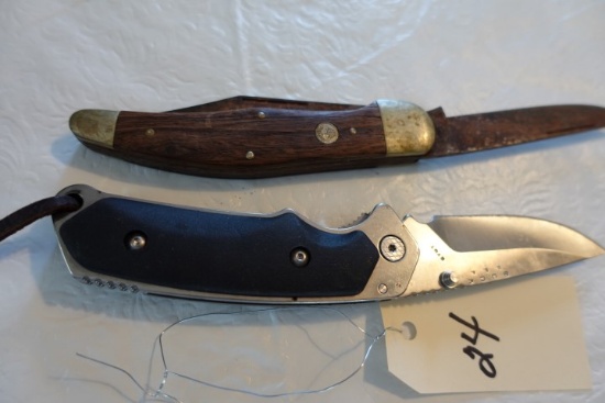 TWO FOLDING KNIVES BUCK AND ONE WITH WOODEN HANDLE