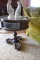 GLASS TOP DISPLAY TABLE APPROX 20 INCH ACROSS X 22 INCH TALL