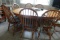 OAK OVAL TOP TABLE APPROX 60 INCH X 41 INCH WITH 7 MATCHING CHAIRS