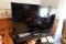 SAMSUNG FLAT SCREEN TV APPROX 48 INCH WITH ENTERTAINMENT CENTER AND DECORAT