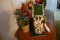 TABLE LOT INCLUDING CERAMIC BIRD HOUSES ARTIFICIAL FLOWERS HUMMINGBIRD CAND