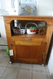 OAK MICROWAVE CABINET WITH CONTENTS SERVING PCS AND BASKETS
