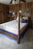 ANTIQUE POSTER BED WITH DECORATIVE PILLOWS