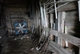 CONTENTS OF BARN INCLUDING ANTIQUE HOE BUSH AXES SAWS HUB CAPS CAST IRON KI