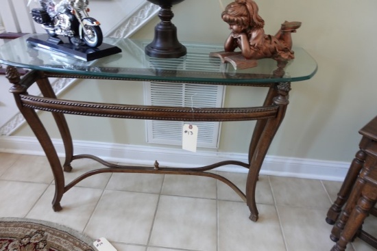 GLASS TOP CONSOLE TABLE WITH PINEAPPLE TOPS AND BRASS COLOR FRAME