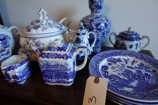 LOT OF BLUE AND WHITE CHINA INCLUDING TEA POTS DISHES AND MORE