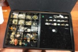 LARGE JEWELRY BOX OF COSTUME JEWELRY RINGS PINS NECKLACES AND EARRINGS