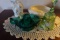 TABLE LOT INCLUDING GREEN GLASS JUICER FENTON BELL AND FIGURINES AND ROSE B
