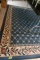 BLUE RUG APPROX 10 X 8