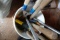BUCKET OF TOOLS HEDGE TRIMMERS STAPLERS AND MORE