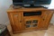 OAK ENTERTAINMENT CENTER INCLUDING VCR DVD  AND MORE  22 X 45 X 30 INCH