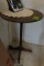 SMALL WALNUT COLOR PLANT STAND APPROX 2 FEET TALL X 12 INCH ACROSS