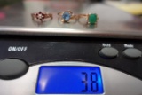 3 10 KT GOLD RINGS WITH MISC STONES SIZES 4.5 TO 5 3.7 DWT
