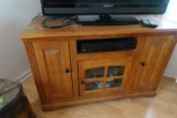 OAK ENTERTAINMENT CENTER INCLUDING VCR DVD  AND MORE  22 X 45 X 30 INCH