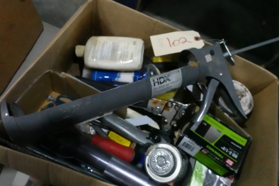 BOX LOT TOOLS INCLUDING CAULKING GUNS STAPLERS RAZOR KNIVES CHISELS FLASHLI