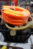 TOTE FULL OF RATCHET STRAPS ELECTRICAL CORDS AND EXTENSIONS AND AIR HOSE