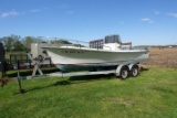 #4001 1979 SHAMROCK 20' CENTER KEEL DRIVE CONSOLE WITH 1985 LOAD RITE TRAIL