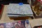 LOOSE LEAF FULL OF COKE MEMORABILLA AND COCA COLA CASSETTE AND VCR TAPES