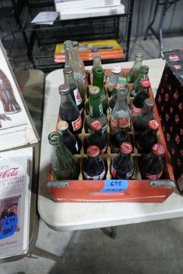 RED COCA COLA CRATE FULL COLLECTIBLE COKE AND MISC SODA BOTTLES