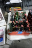 RED COCA COLA CRATE FULL COLLECTIBLE COKE AND MISC SODA BOTTLES