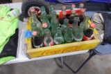 YELLOW WOODEN COCA COLA CRATE FULL OF COLLECTIBLE COCA COLA BOTTLES
