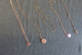 5 GOLD NECKLACES INCLUDING ANTIQUE LOCKET AND DAUGHTER OF AMERICA