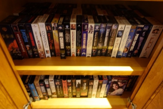 CABINET FULL OF VCR TAPES ALL GENRES