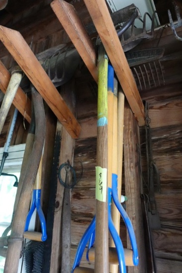 2 LOTS OF TOOLS INCLUDING HAY FORKS PICK AXES AND MORE