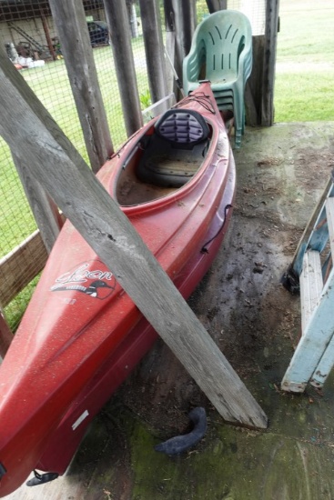 FIRST SECTION OF CORN CRIB INCLUDING TWO OLD TOWN KAYAKS LADDER PATIO FURNI