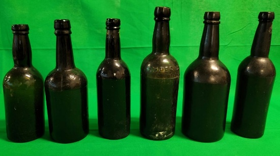 Six Black Glass Bottle lot
