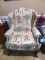 Upholstered Wing Chair with Brass Tacks