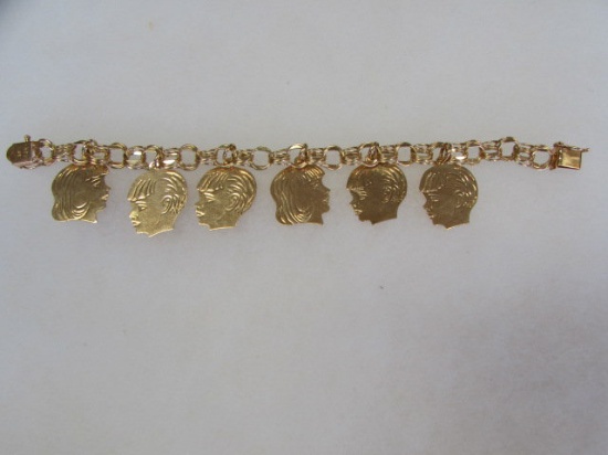 14 Kt. Yellow Gold Charm Bracelet With (6) Children's Silhouette Charms