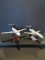 (2) Delta Connection Model Airplanes on Stands