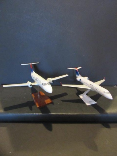 (2) Delta Connection Model Airplanes on Stands