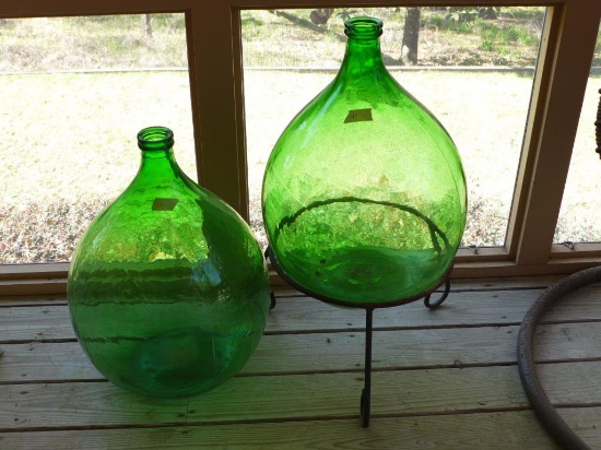 (2) Green Glass Bottles, (1) Wrought Iron Stand