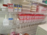 Shelf of Assorted Plastic Storage Containers