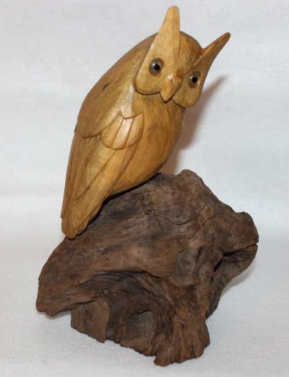 Hand carved wooden owl on wooden base . 8"tall