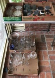 Large assortment of glass and metal flower frogs