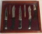 (6) Collectible  Knives in Glass Top Wooden