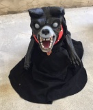 Jumping dog Halloween figurine.  Evil glowing