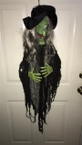 Battery-operated Lighted Talking Halloween Witch