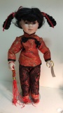 Black Hair Porcelain Doll In Japanese Apparel