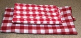 (2) Red and White Checkered Table Cloths - (1)