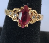 Ladies Size 10 1/2 Ring with Red Center Stone and (4) Small