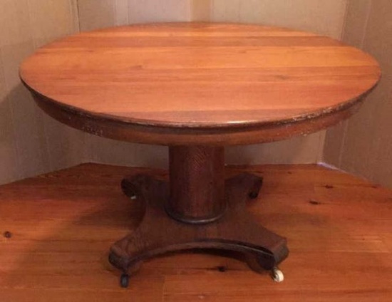 Round Oak Pedestal Table on Casters - 44” Diameter