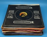 (25) 45 Records in Sleeves
