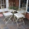 Metal Glasstop Table and (4) Chairs