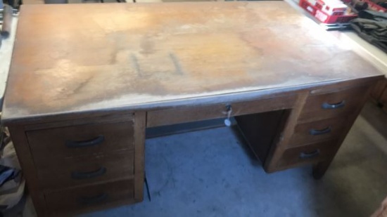 Oak 6 drawer kneehole desk - needs trfinishing.